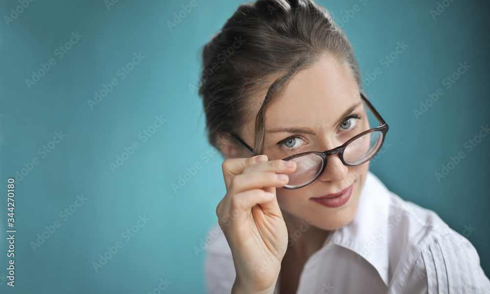 portrait of a beautiful woman with glasses portrait of a beautiful woman with glasses
