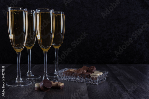 glasses filled to the brim with champagne and chocolate