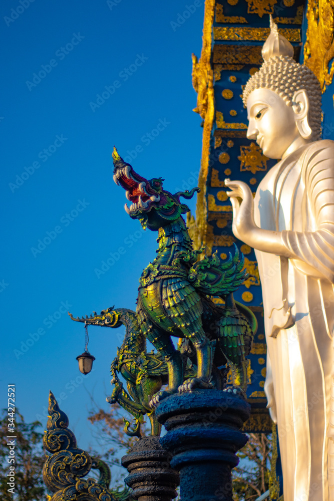 Fototapeta premium A beautiful view of Wat Rong Suea Ten, the Blue Temple at Chiang Rai, Thailand.