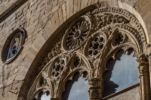 Church Orsanmichele  Kitchen Garden of St. Michael . Details of arcade ground floor  decorated with tracery gothic windows. Via Calzaiuoli  Florence  Tuscany  Italy.