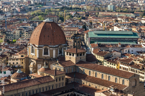 The dome of the Cappella dei Principi dominates the San Lorenzo architectural complex (Medici Chapels). Aerial view from Giotto's Campanile. Florence, Tuscany, Italy.