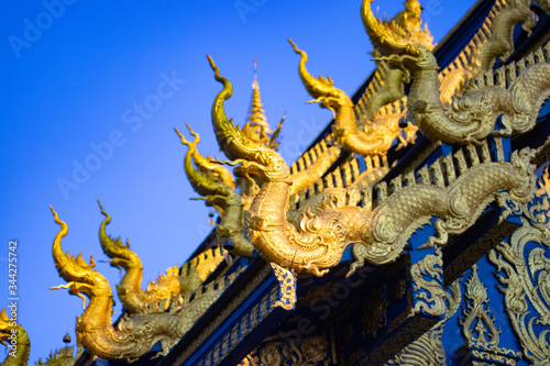 A beautiful view of Wat Rong Suea Ten, the Blue Temple at Chiang Rai, Thailand. © joseduardo