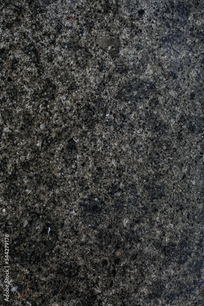 Dark grey stone background. Granny texture of monochrome marble surface without objects. Dark grey stone background. Granny texture of monochrome marble surface without objects.