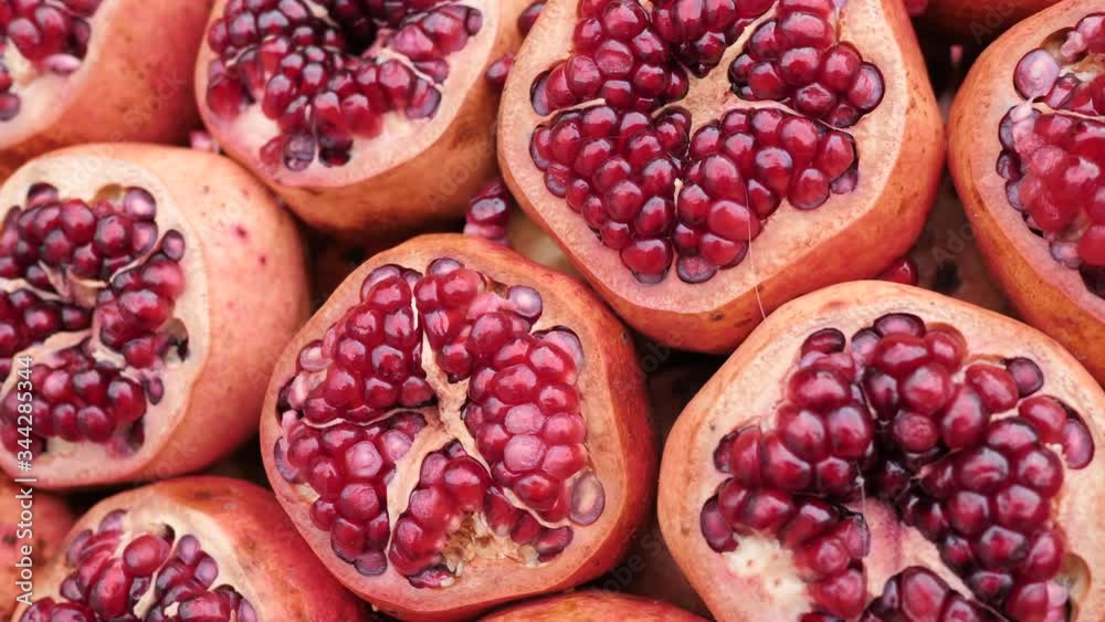 Sliced pomegranate fruits at the bazaar of Turkey. Sliced pomegranate fruits at the bazaar of Turkey.