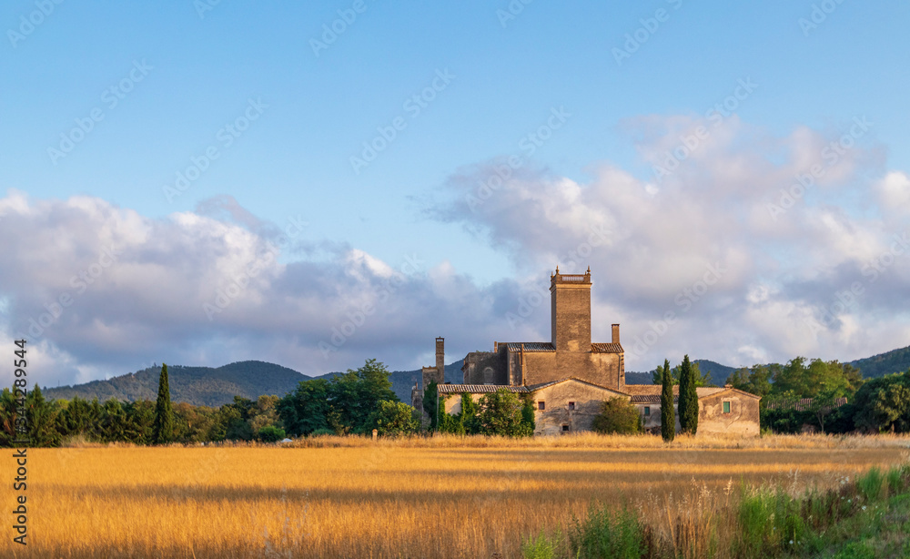 Rural village with straw bales at sunset on the Mediterranean coast Rural village with straw bales at sunset on the Mediterranean coast
