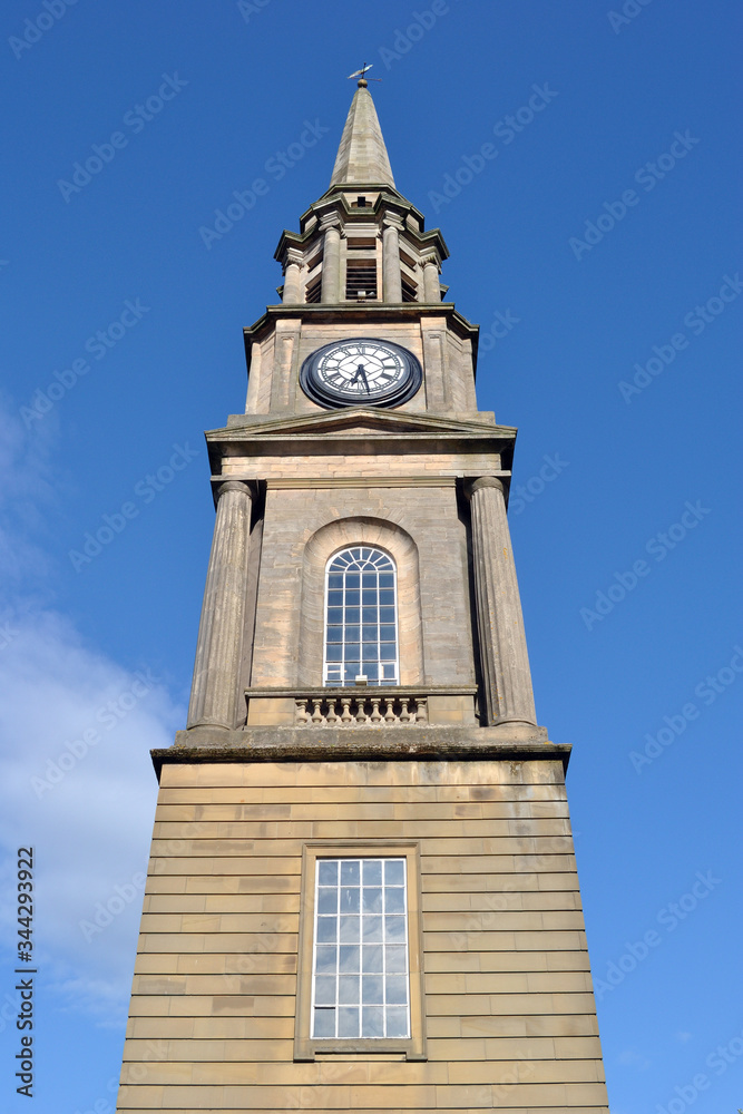Tall Stone Spire of Public Clock Tower Seen from Below 