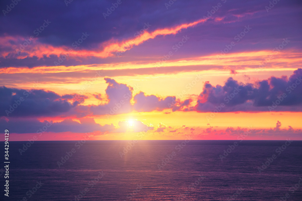 scenic dramatic ocean orange tropical landscape, golden sunset or sunrise at sea