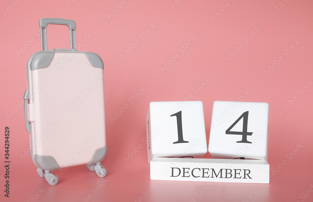 Calendar wooden cube. December 14, time for a winter holiday or travel, vacation calendar Calendar wooden cube. December 14, time for a winter holiday or travel, vacation calendar