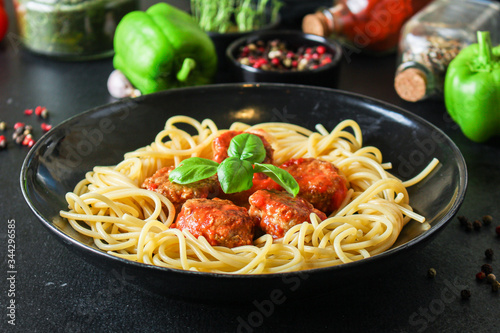pasta spaghetti with meatballs and tomato sauce Menu concept healthy eating. food background top view copy space for text