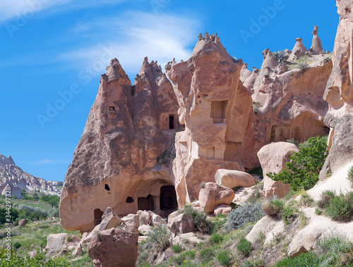 Unique geological formations and caves in Zelve valley, Cappadocia, Central Anatolia, Turkey photo