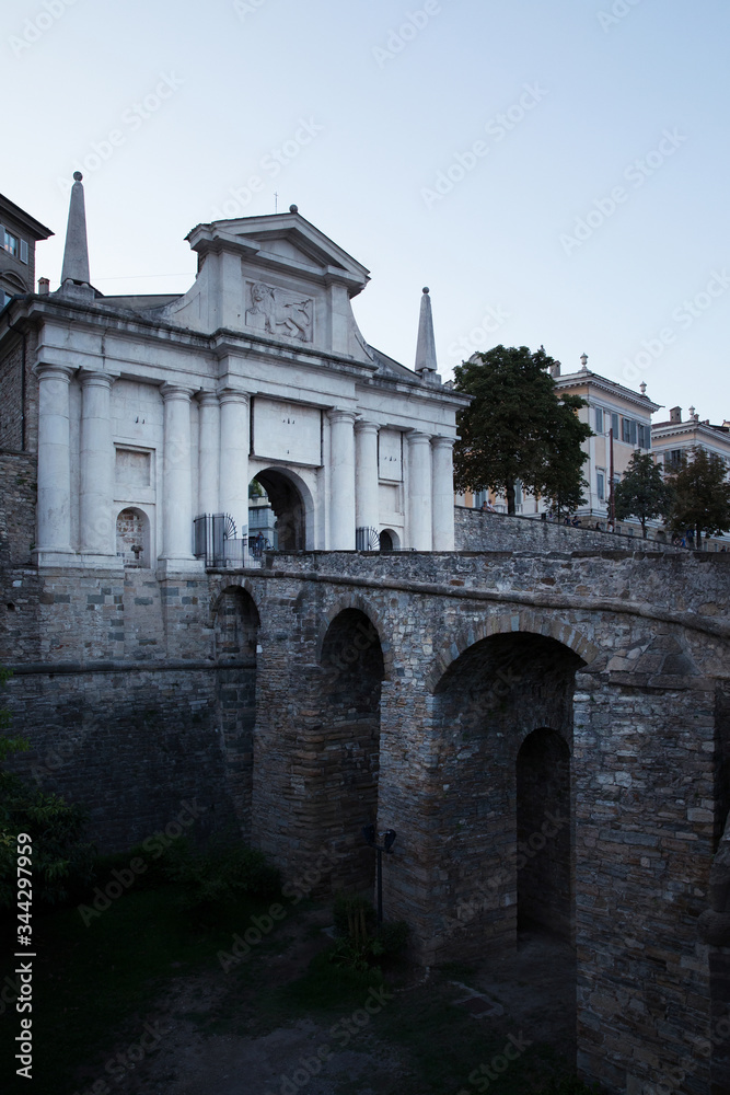 Historical bridge with San Giacomo Gate (Porta San Giacomo) in Bergamo near Milan, Lombardy, Italy.