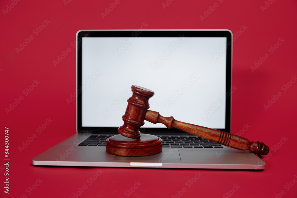 Law legal technology concept. Judge gavel and computer on desk of ...