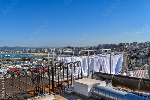 White laundry hung on rooftops of Tangier, Morocco. © Kathryn