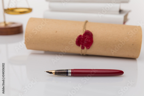 Notary's public pen and stamp on testament and last will. Notary public tools.