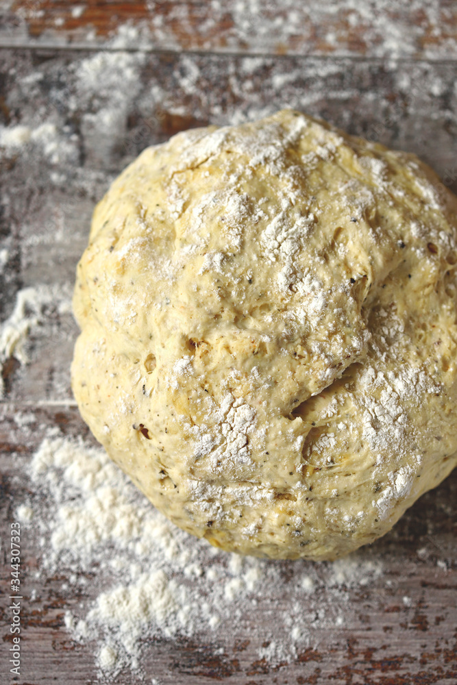 Selective focus. Macro. Yeast dough on the table. Dough for bread or pizza. Cooking at home. Baking at home. Selective focus. Macro. Yeast dough on the table. Dough for bread or pizza. Cooking at home. Baking at home.