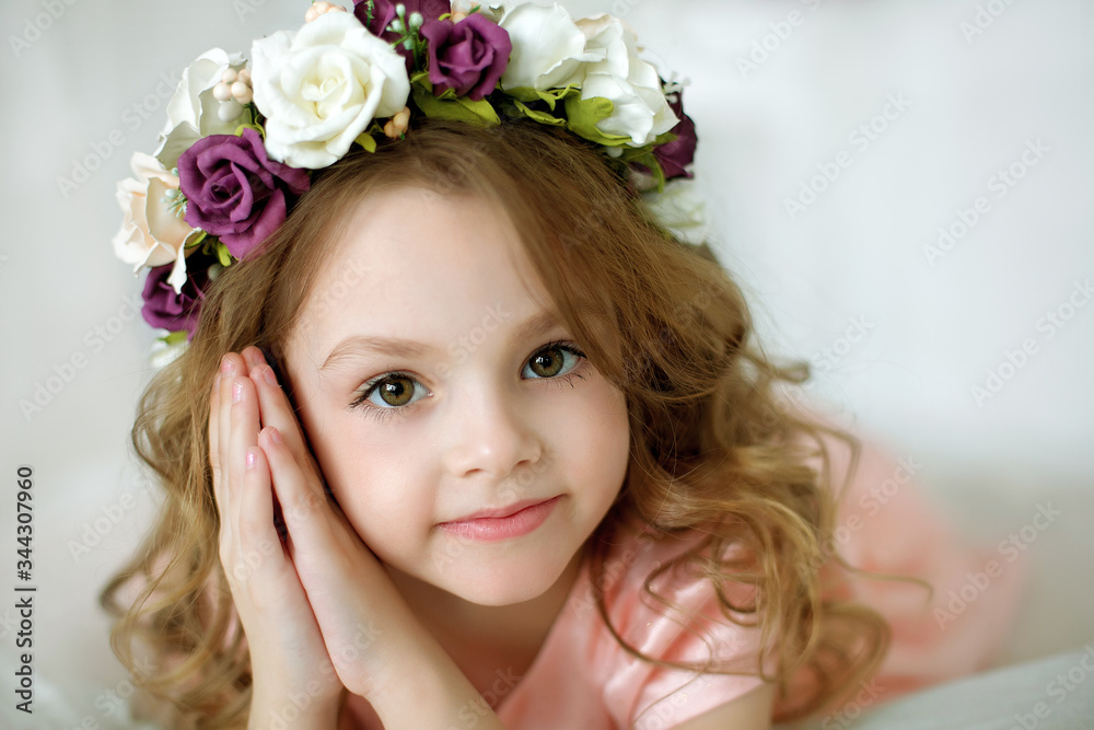 beautiful girl in a rim of flowers with flowers beautiful girl in a rim of flowers with flowers