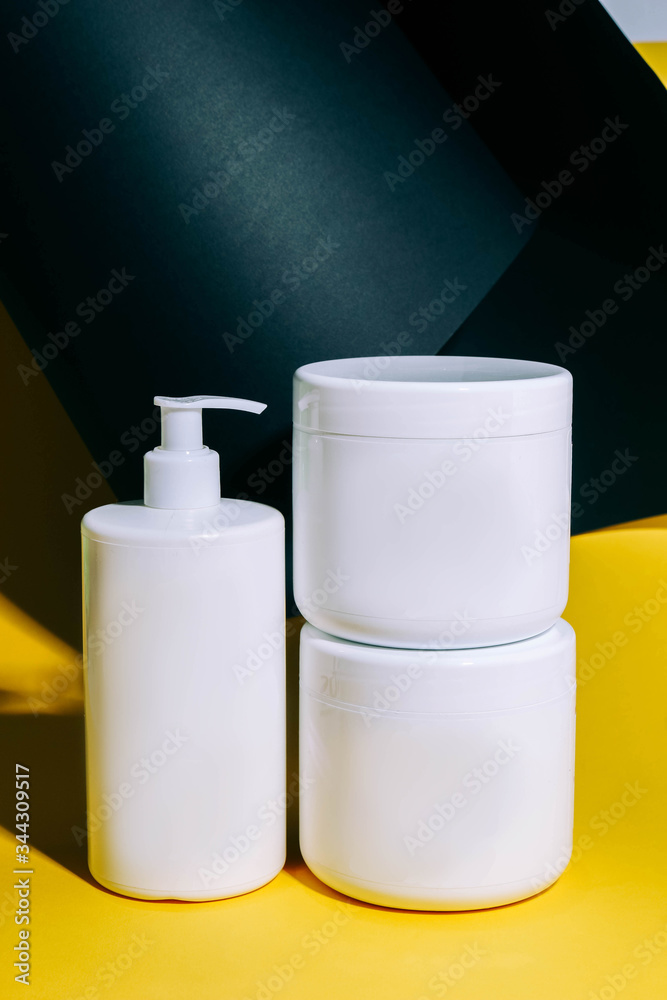 cosmetics for skin care on a yellow background