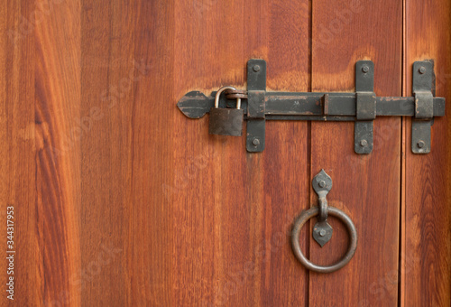 The lock on the old wooden door