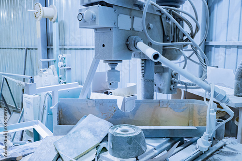 Drilling machine in the dus...