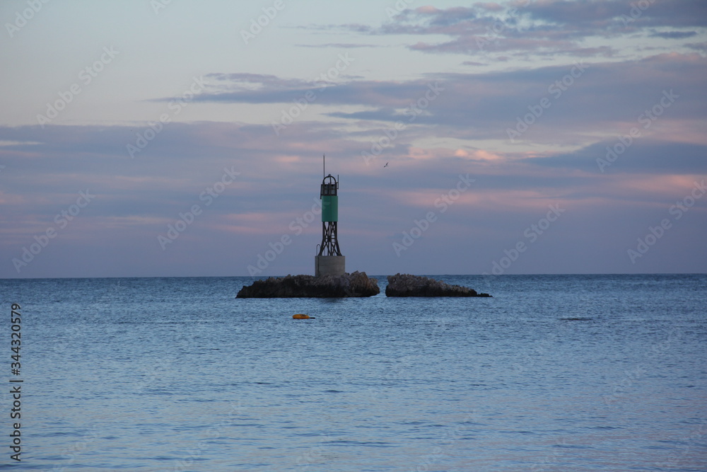 lighthouse at sunset spain