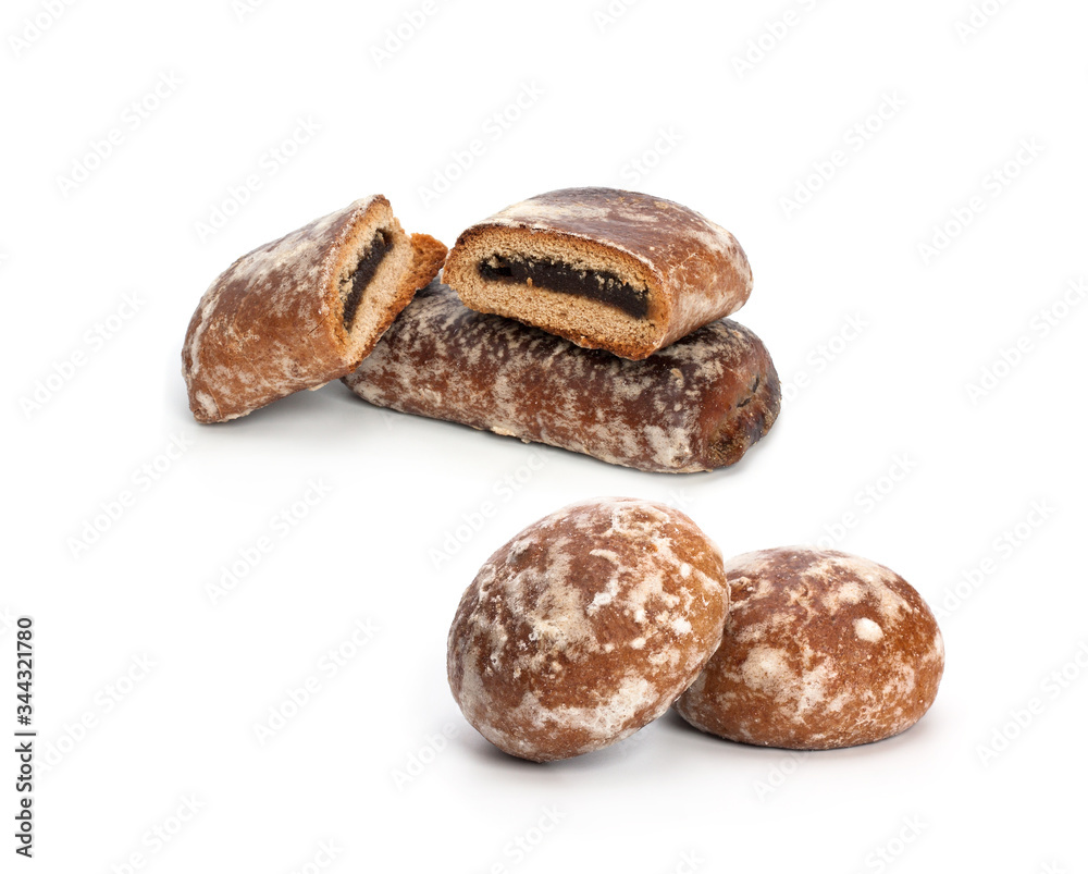 Gingerbread cookies with jam on a white background.