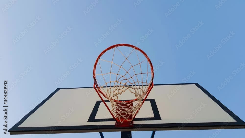 basketball hoop on blue sky background. basketball hoop on blue sky background.