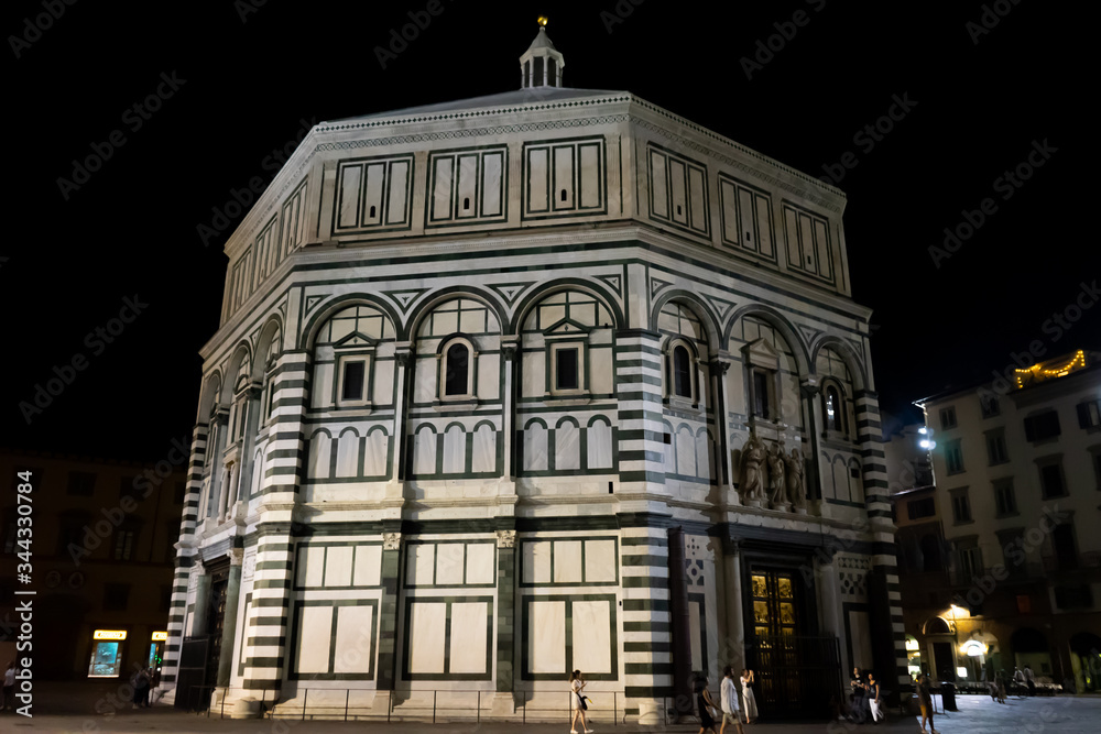 View of the famous baptistery of the city of Florence at night in Tuscany, Italy View of the famous baptistery of the city of Florence at night in Tuscany, Italy