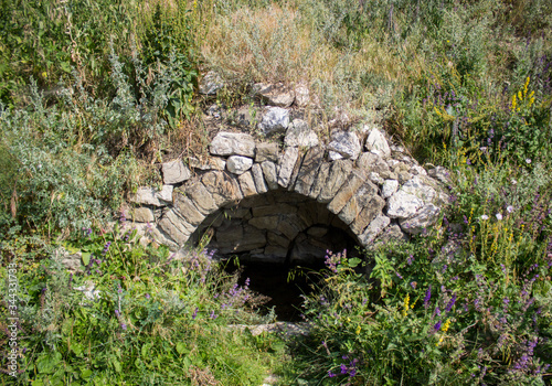 Bridge over a rocky meadoq bridge nature