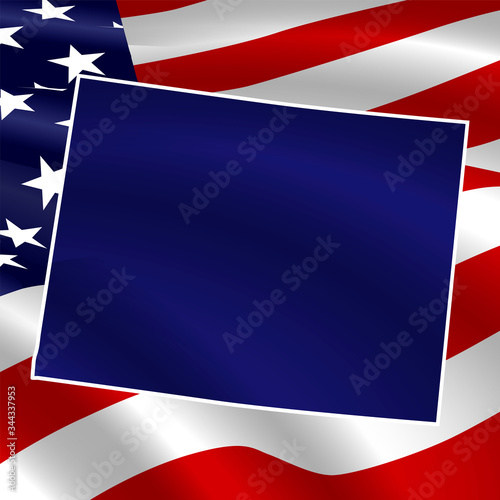 United States, Wyoming. Dark blue silhouette on the background of the USA flag