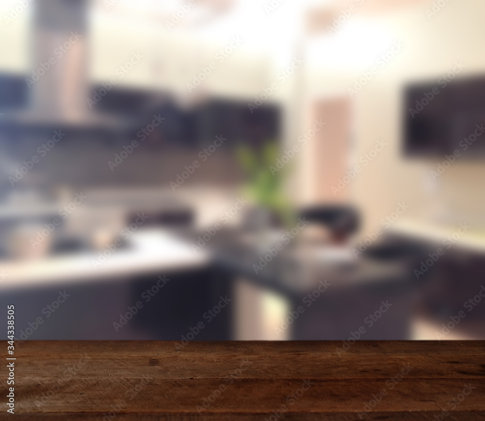 wood table on blur modern living room interior background - can used for display or montage your products wood table on blur modern living room interior background - can used for display or montage your products