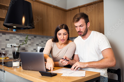 Couple calculating their domestic bills