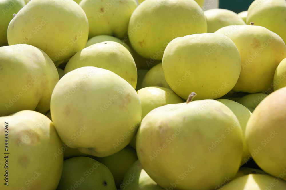 green apples in a market