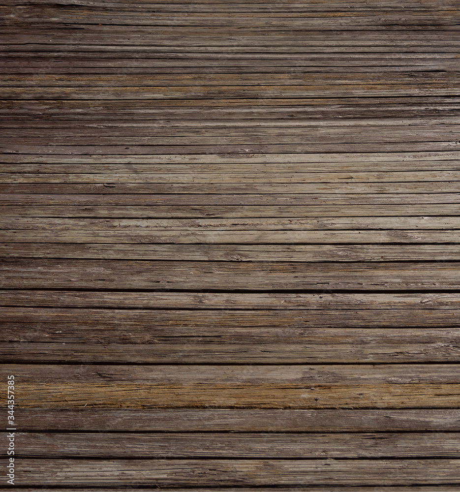 Obraz premium weathered wooden planks of seaside dock for background and texture