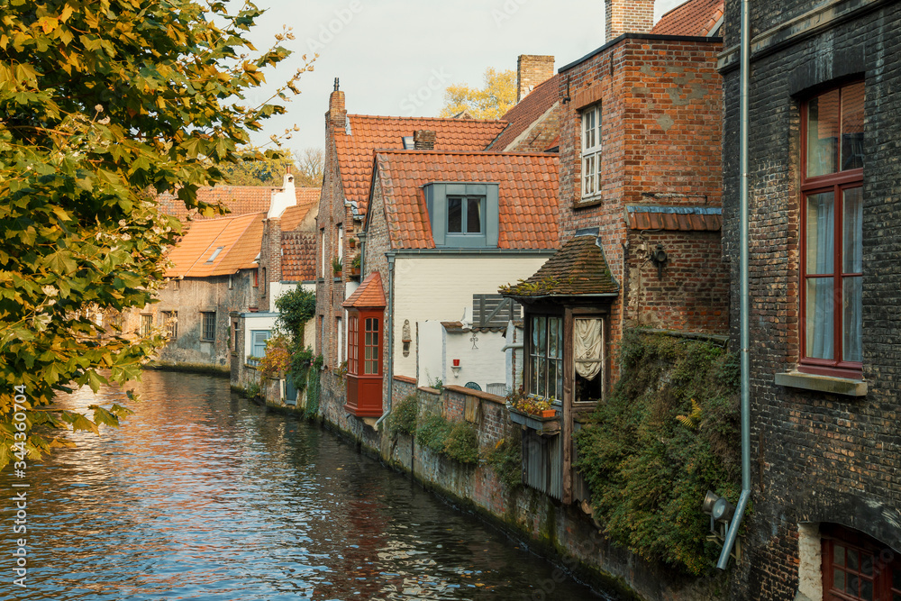 Panoramic landscape of Bruges canal with medieval houses