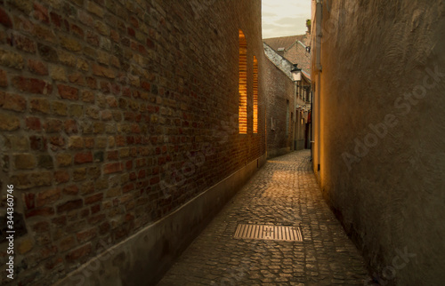 Panoramic view of cobbled street alley in Europe