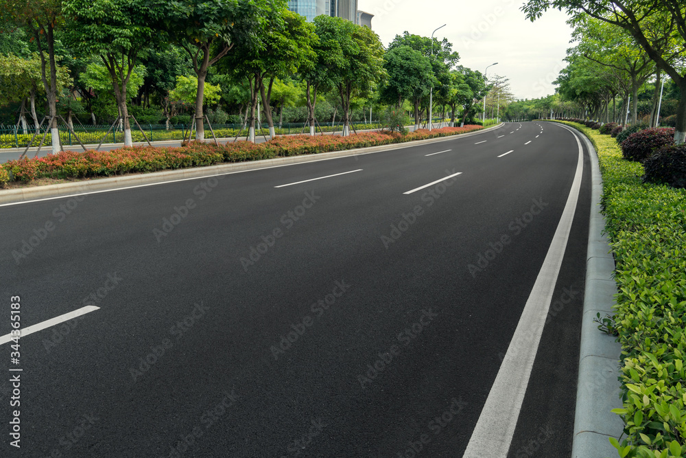 curve asphalt road in early morning city curve asphalt road in early morning city