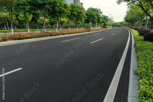 curve asphalt road in early morning city © redtiger9