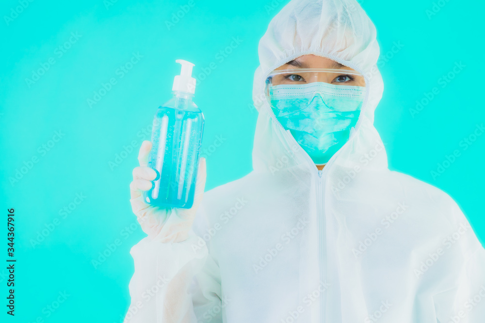Portrait beautiful young asian doctor woman with alcohol gel Portrait beautiful young asian doctor woman with alcohol gel