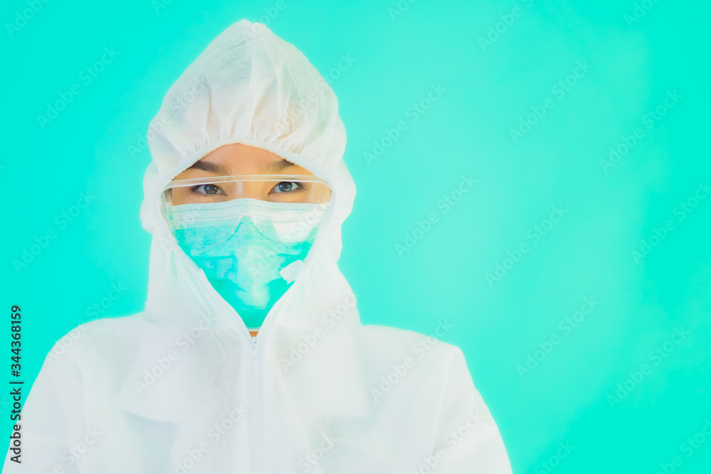Portrait beautiful young asian doctor woman wear ppe or  personal protective equipment