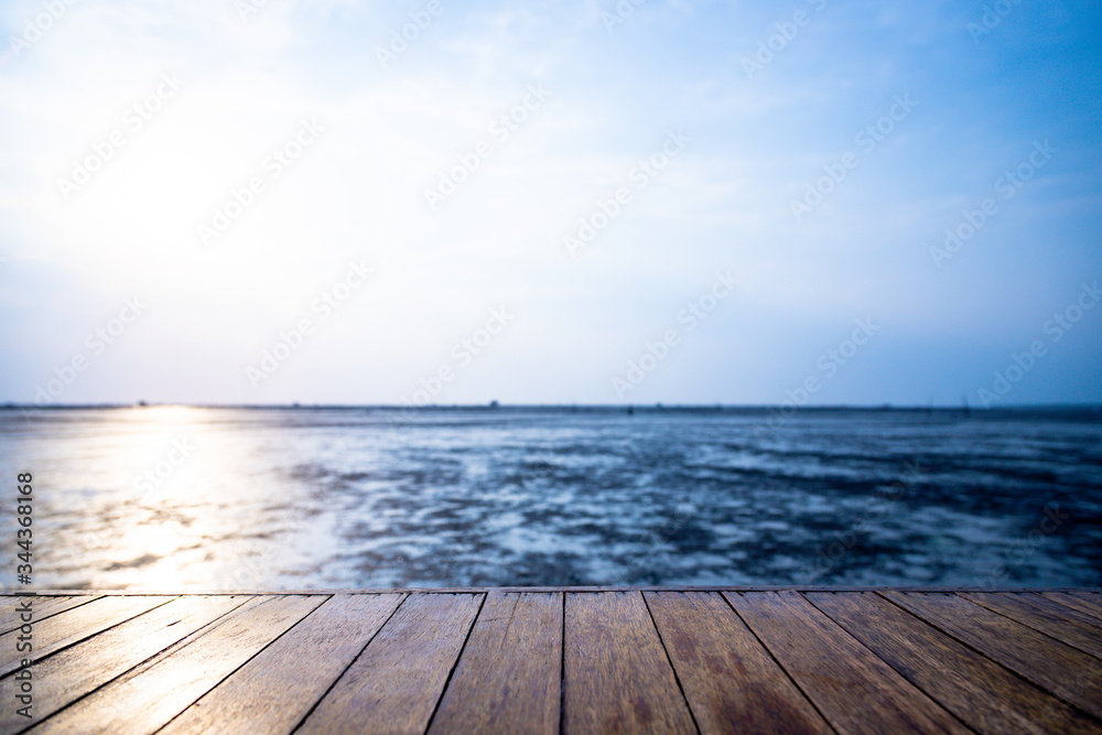 The wood floor extends into the sea when the water drops The wood floor extends into the sea when the water drops