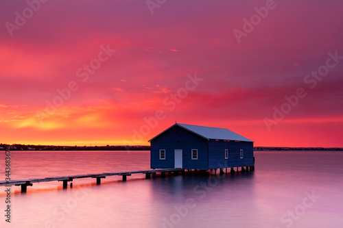 Sunrise at the boathouse on the river