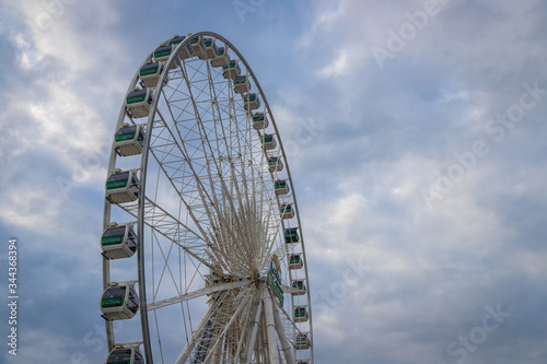 Ferris Wheel with blue sky on sunny day