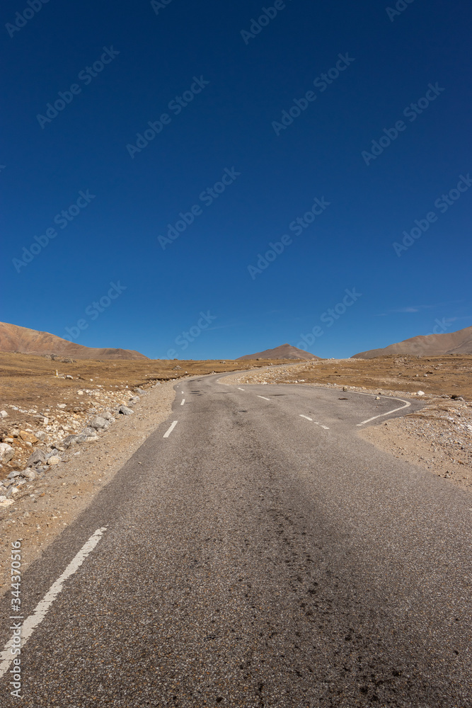 isolated picturesque tarmac road in himalaya mountain