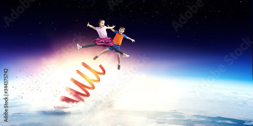 Φωτογραφία Kids bouncing in the space
