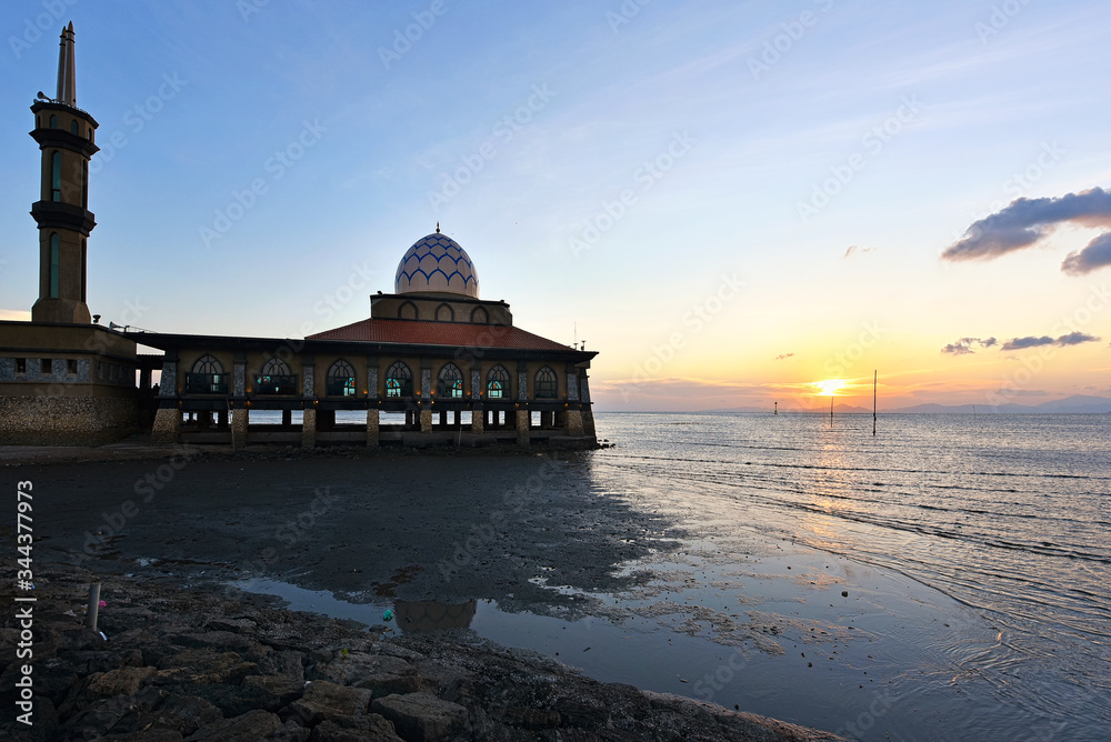 Beautiful mosque at sunset. Alhussain mosque, located in Kuala perlis, Malaysia.