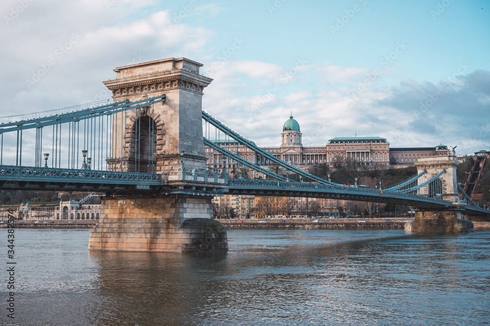 Chain bridge on the Danube river in Budapest, in the background the Buda castle