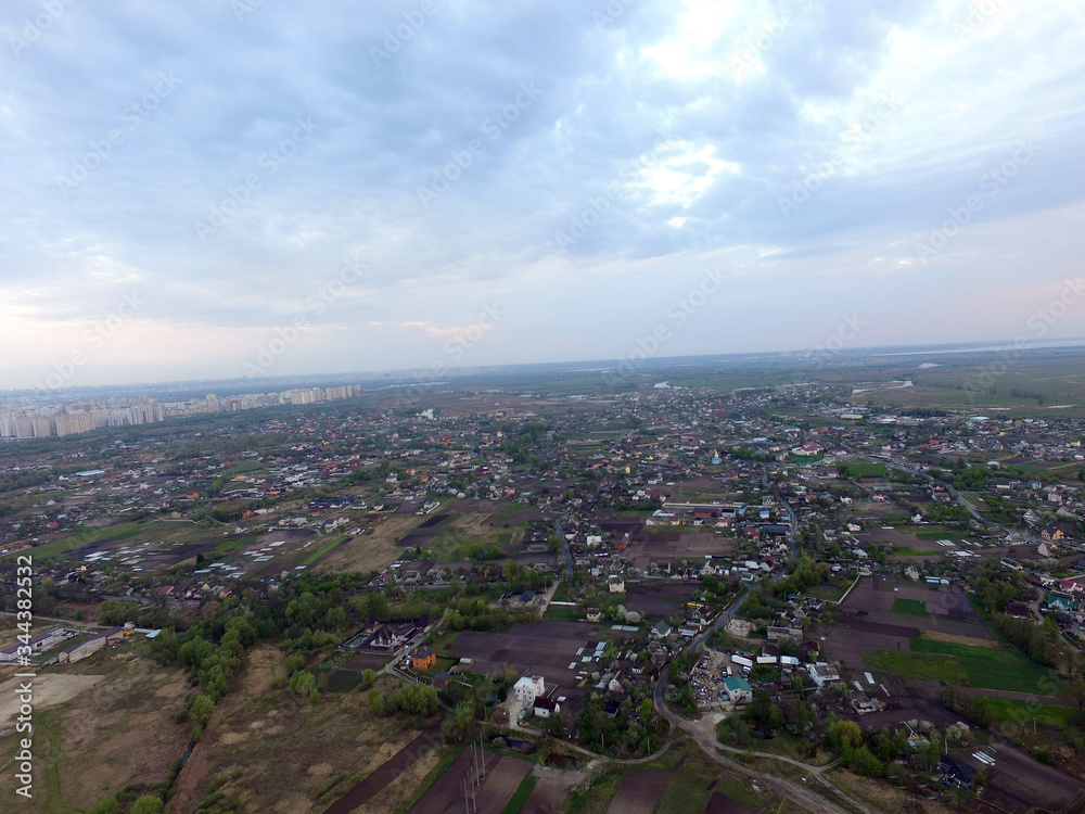 Aerial view of the saburb landscape (drone image). Near Kiev. Early morning. Sunrise time