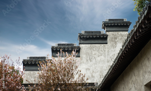  The ridge decorated with tile on the isolation wall of traditional Chinese Jiangnan house photo