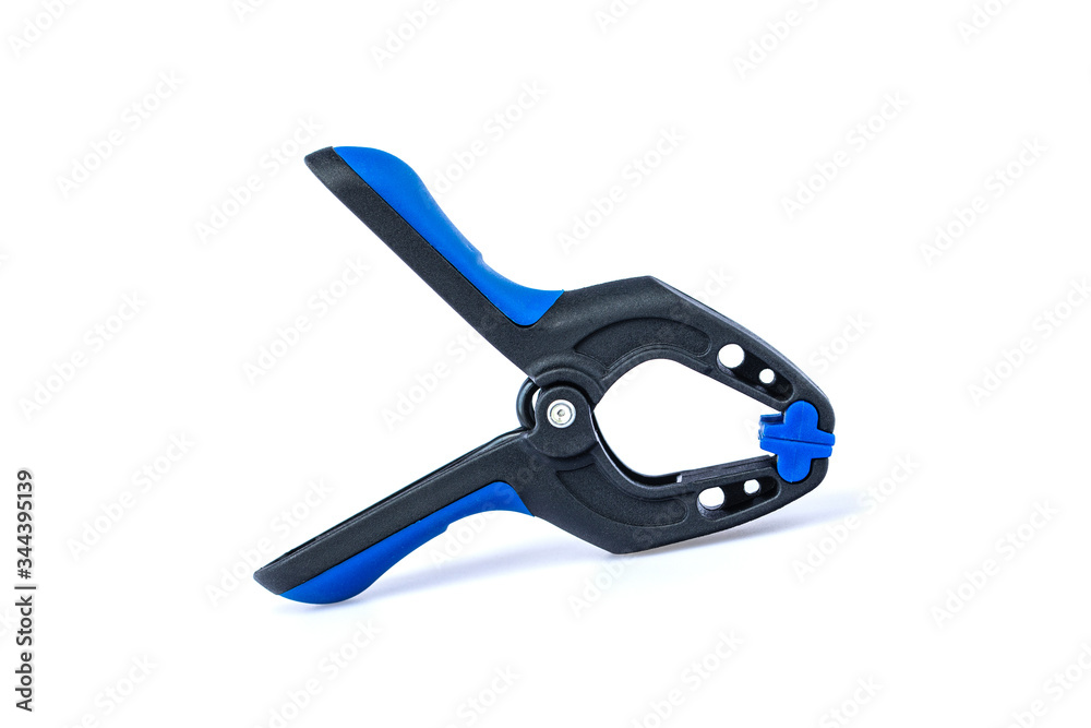 Black and blue spring clamp isolated on white background with clipping path. Black and blue spring clamp isolated on white background with clipping path.