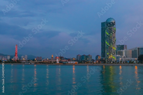 Batumi, Adjara, Georgia. View from the sea on illuminated resort town at evening